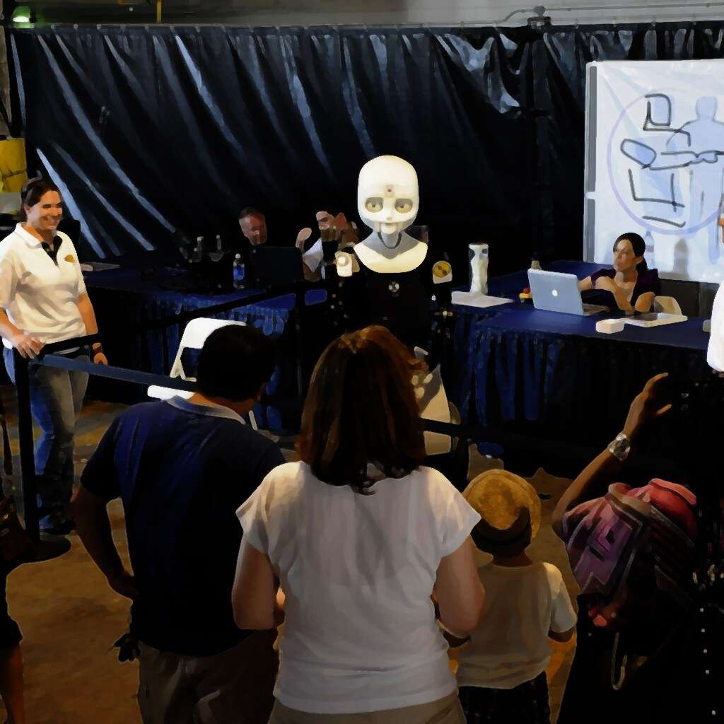 Working with the robot Octavia during a technology demonstration at the Pentagon
